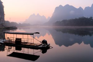Sunrise at Li River, Xingping, Guilin, China. Xingping is a town in North Guangxi, China. It is 27 kilometers upstream from Yangshuo on the Li River